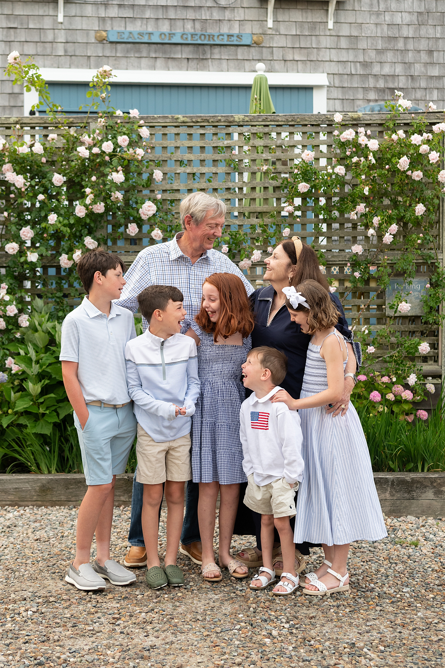 grandparents stand with their grandkids at Old North Wharf