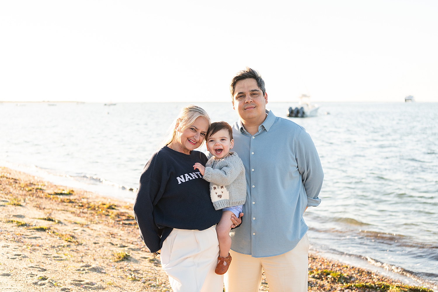 mom, son and grandson at the beach for 1st birthday photos with grandparents