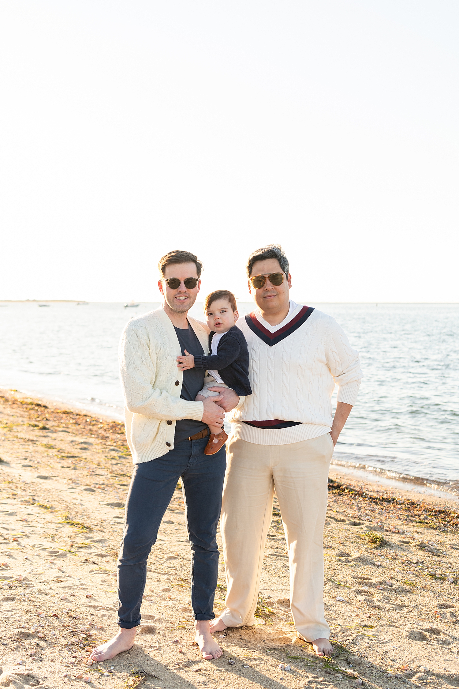 dads stand next to waterline by Nantucket family photographer